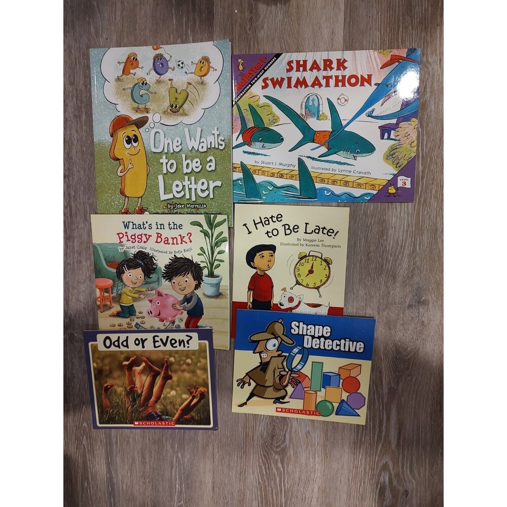 lot of elementary educational books numbers shapes telling time money